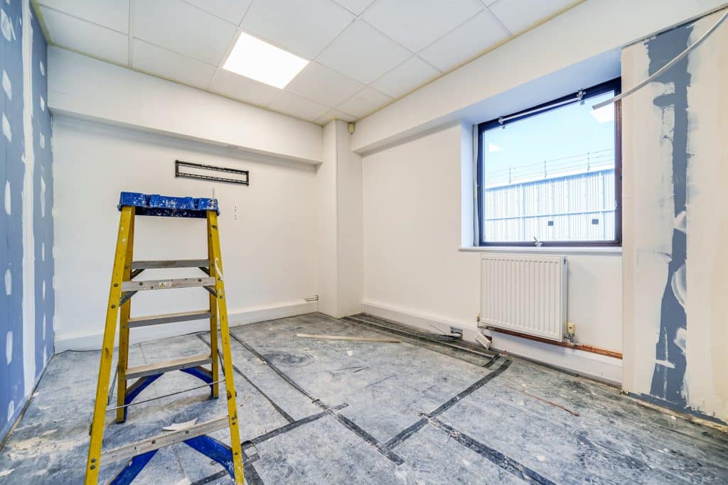 insulation being added into commercial property during the winter months