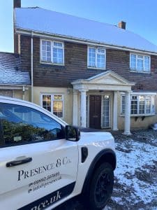 cold conditions covering home in snow, property maintenance checklist for keeping energy costs down during winter
