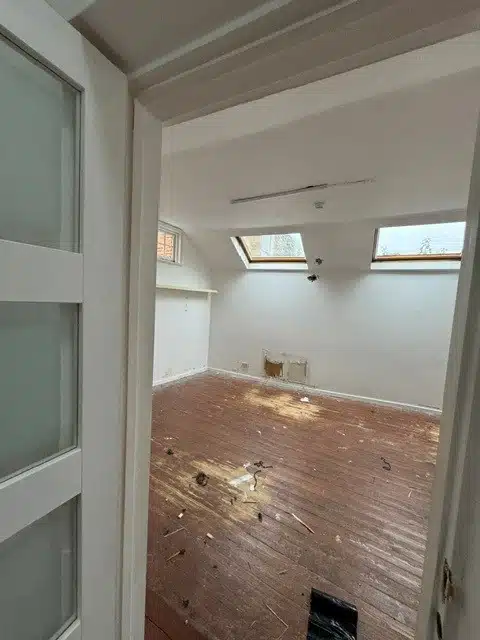 Interior before renovation showing outdated fixtures
