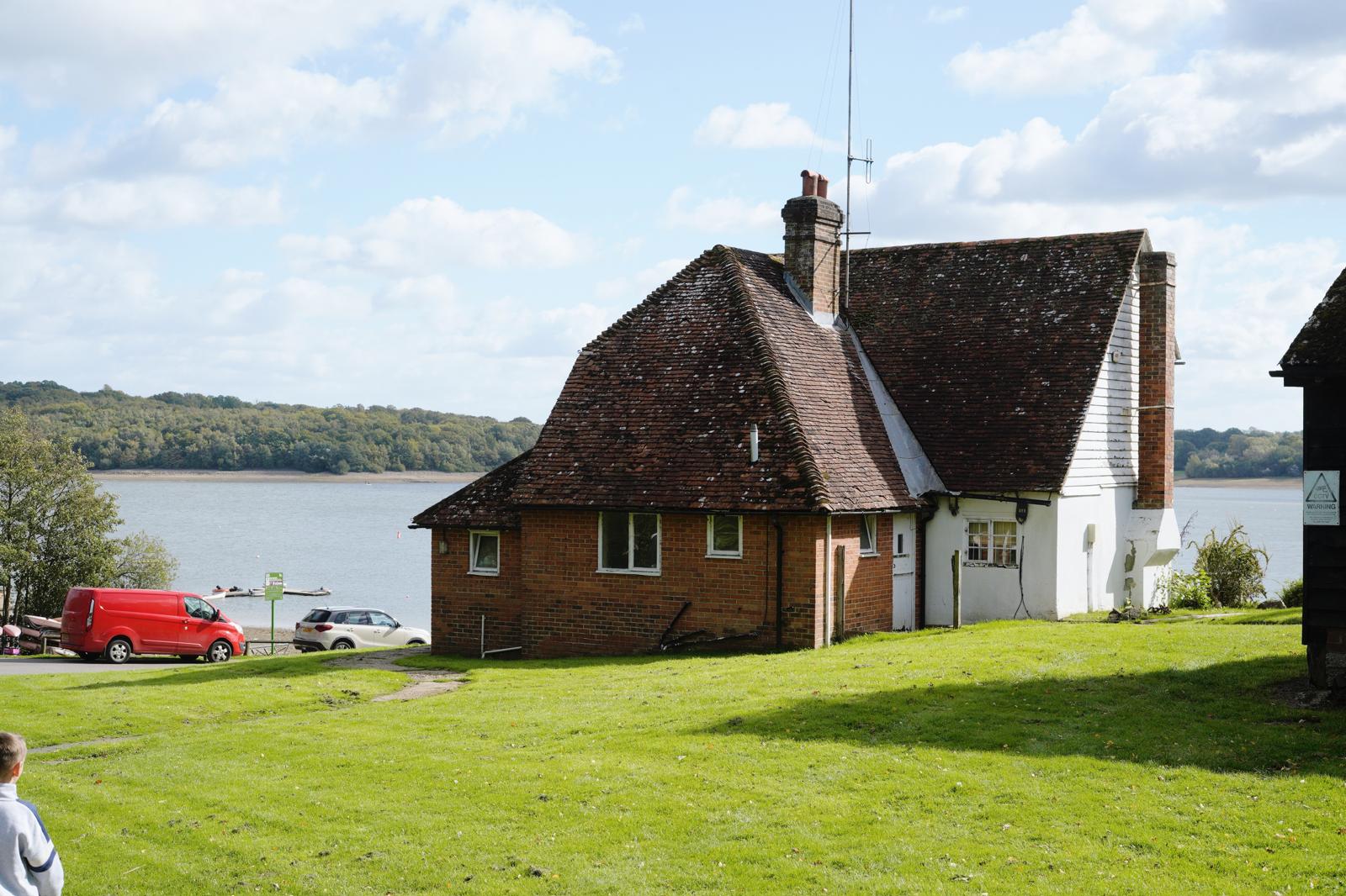 old fishing lodge located on a beautiful estate surrounded by water ready to be developed into airbnb properties.
